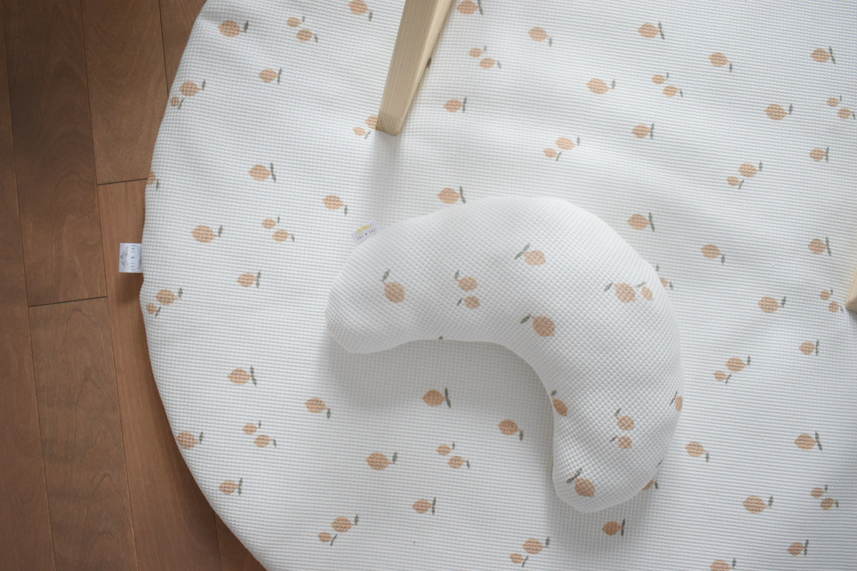 Beige play mat